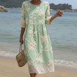 Gabi - Vestido Midi com Estampa de Plantas e Flores