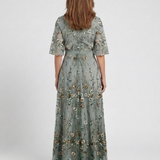 Elga – Vestido longo florido com decote em V